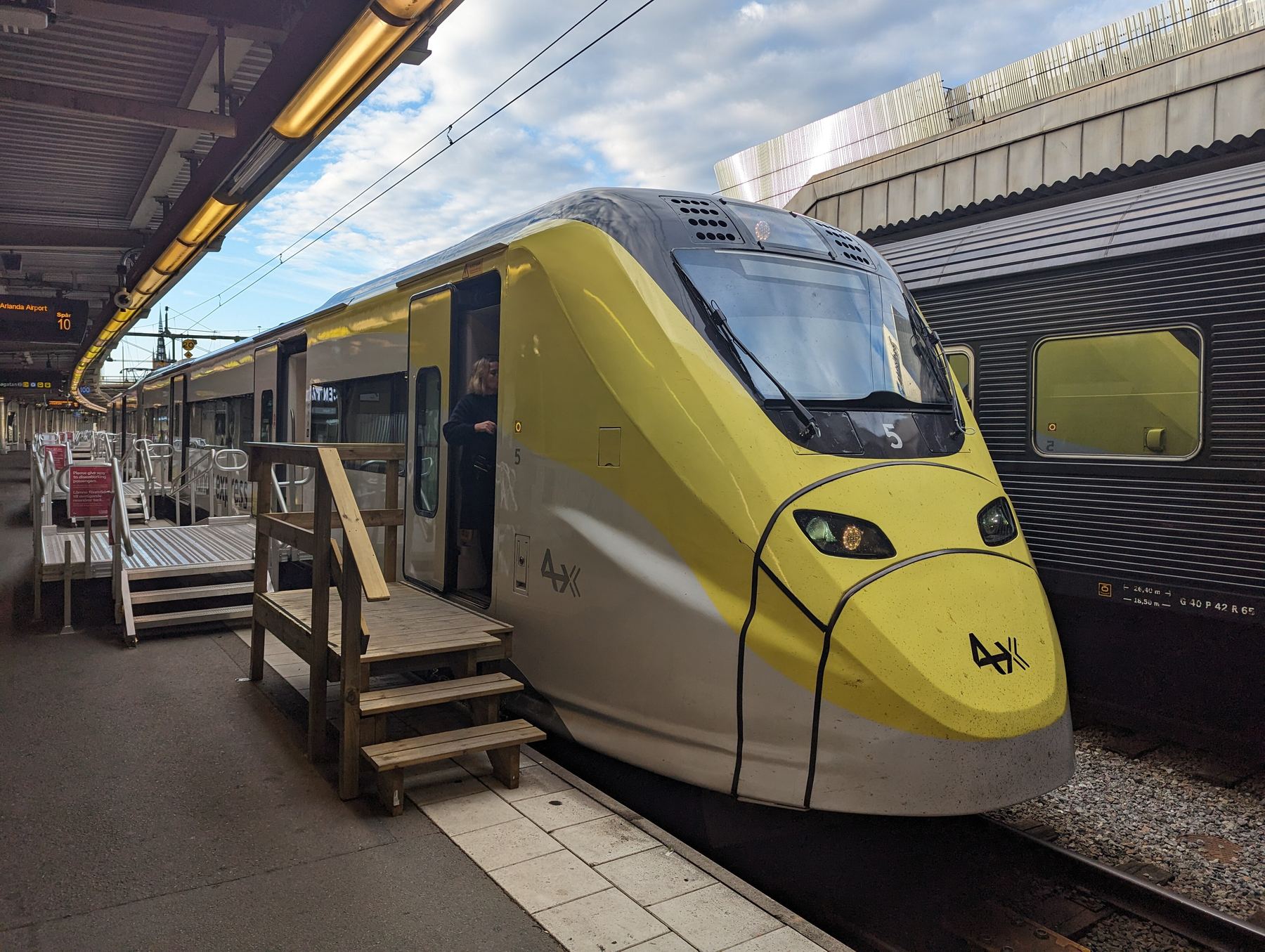 Yellow Arlanda Express train at Stockholm Central Station